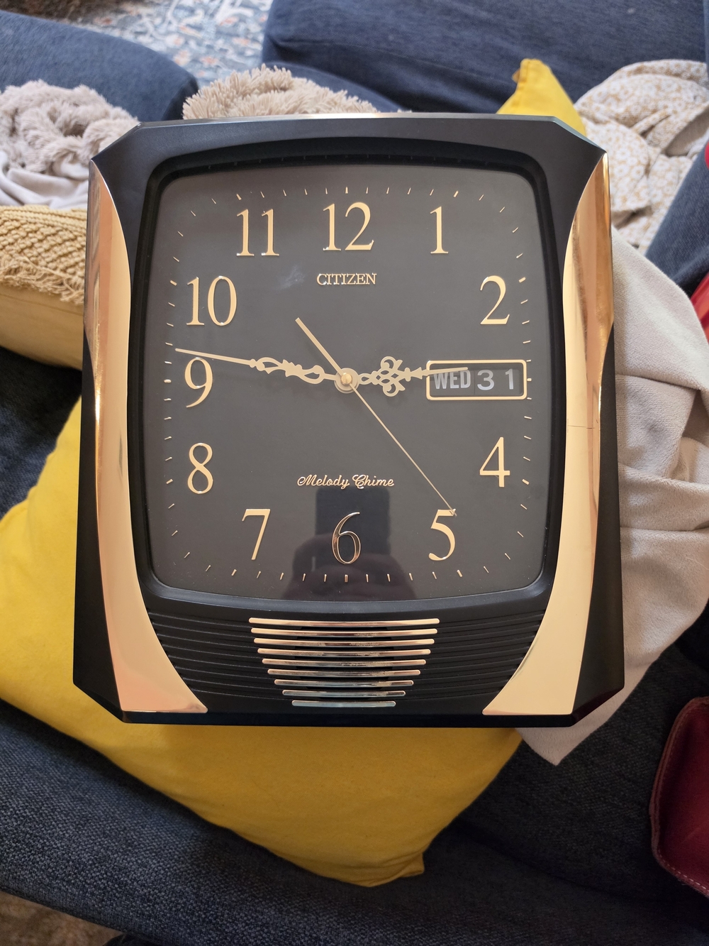 Citizen Black and Gold Melody Wall Clock with Day-Date